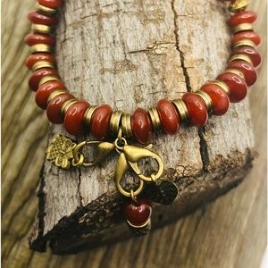 4x8mm Red Agate Carnelian beads with brass accents.
